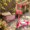 Patinete infantil com cesta rosa musical e luz DM Toys